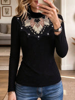 Women's Black High Neck Long Sleeve Top with Sparkly Rhinestone Peacock Pattern